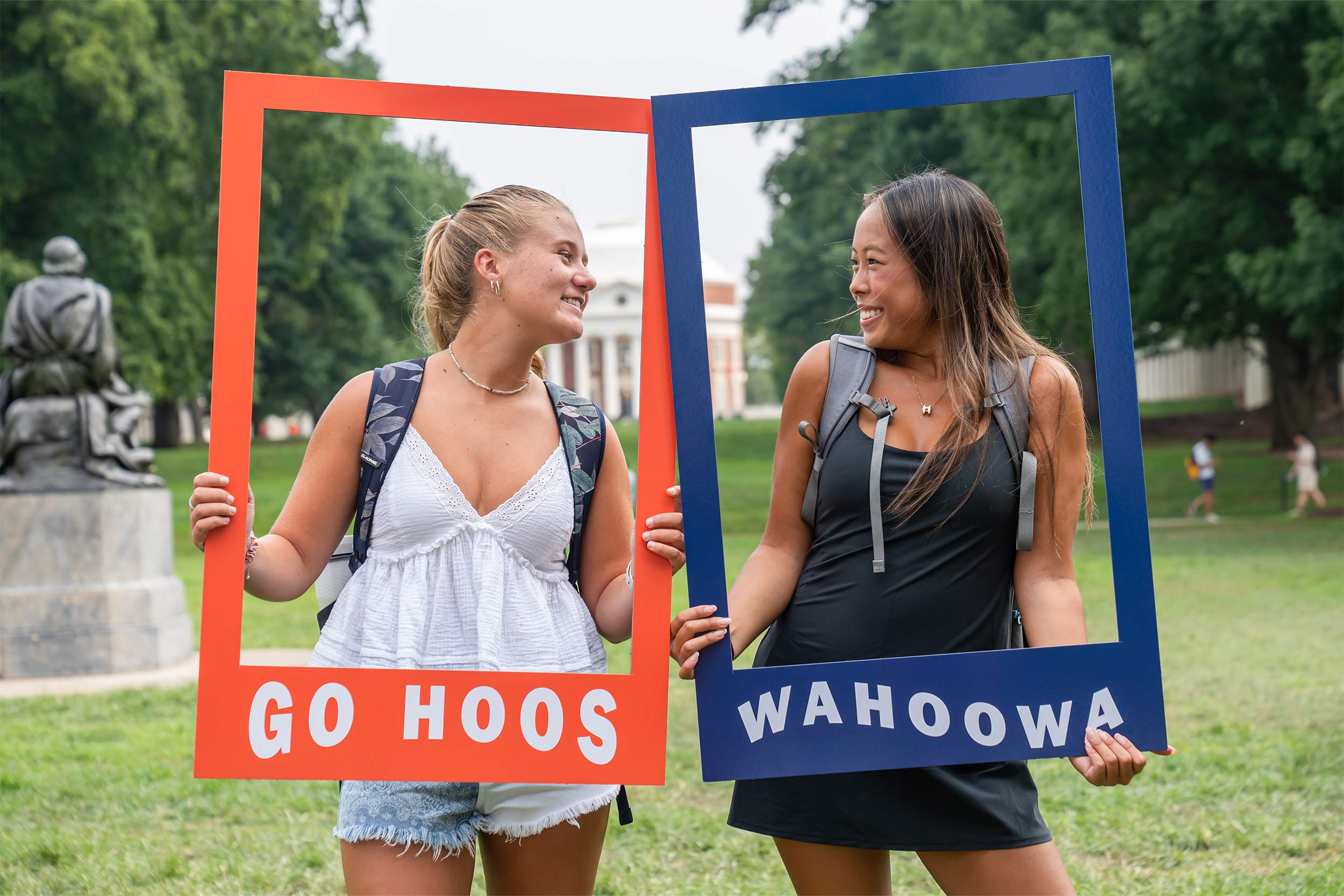 Students posing with props