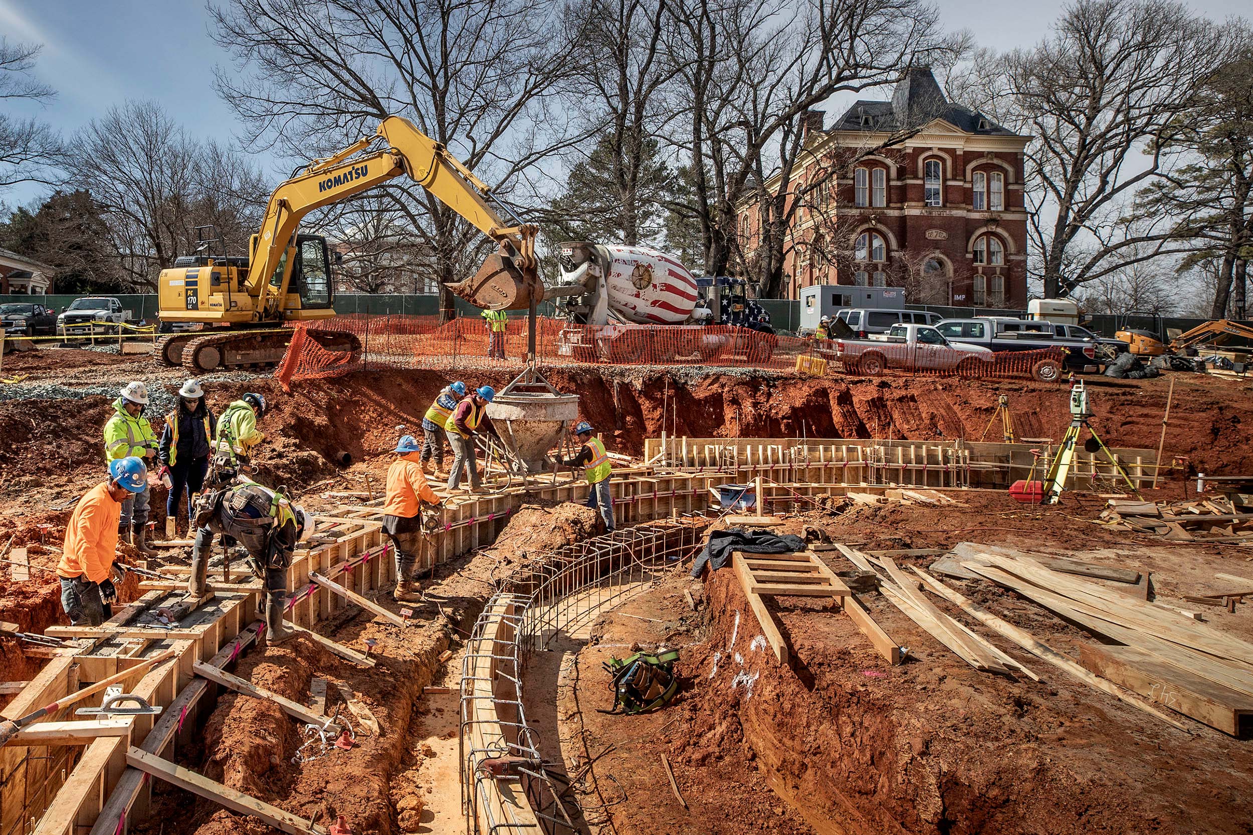 Construction workers forming up the memorial for enslaved laborers