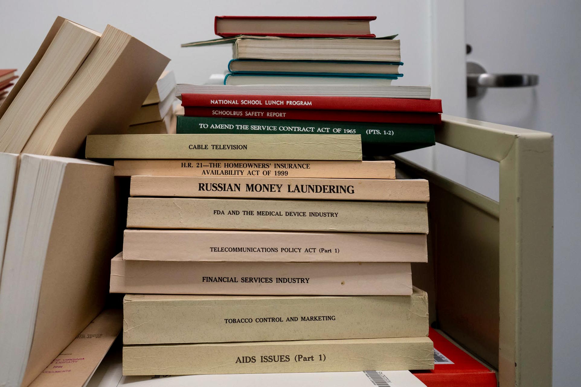 Items stored in the Ivy Stacks include some that have never been checked out or haven’t circulated for decades. Stack of random books